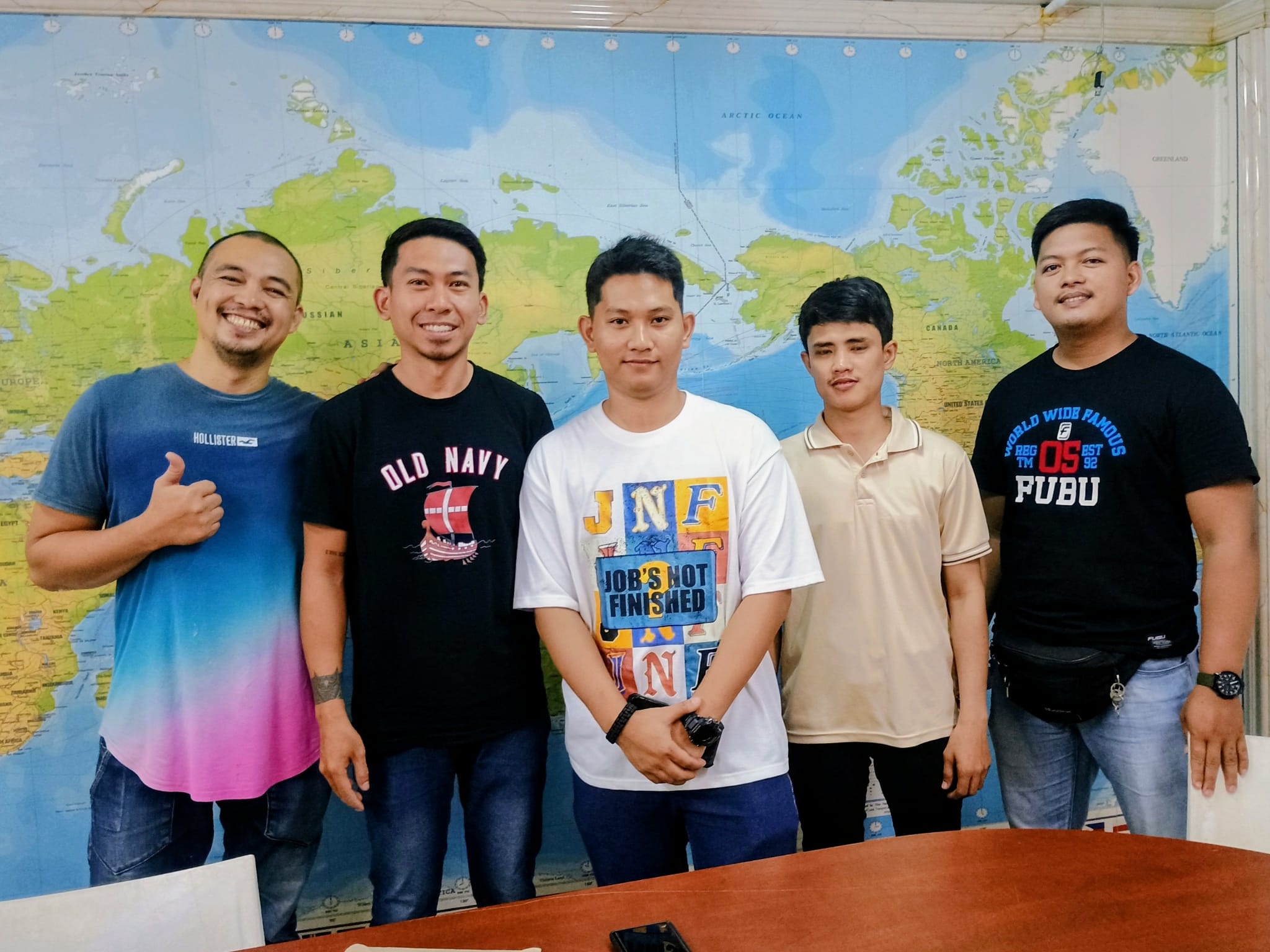 Professional Filipino workers in a meeting